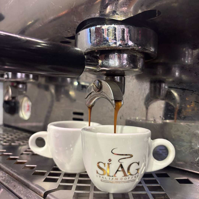Espresso pouring into a SIAG cup